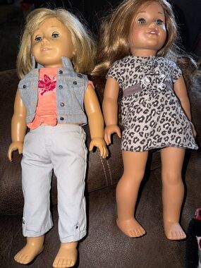 2 American Girl Dolls With An Outfit